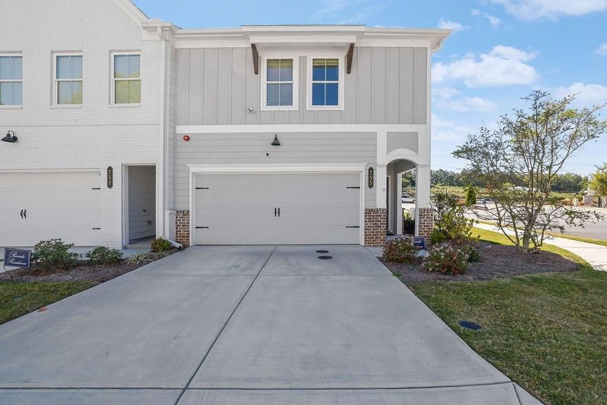 Now priced $10,000 below appraised value!!! Stunning, like-new end-unit townhome located in the highly sought-after Marietta High School District! This home offers a two-car garage and features new LVP flooring throughout the main level and stairs. The open-concept main level showcases a luxury kitchen with white shaker cabinets, quartz countertops, tile backsplash, and an upgraded suite of stainless steel appliances. The kitchen overlooks the spacious living room and adjoining dining area, perfect for entertaining! A half bath and welcoming foyer complete the main level. Upstairs, enjoy a large loft area and three spacious bedrooms with ample closet and storage space. The guest bath features quartz countertops and a luxe shower. The owner’s suite boasts a large walk-in closet with custom system and a spa-like ensuite featuring glass-enclosed tile shower, quartz counters, tile floors, and dual vanities. Relax on the back patio with a small yard maintained by the HOA perfect for grilling, relaxing, and pets for easy living. Community amenities include a pool, playground, fire pit, & open green spaces. Gates at Hamilton Grove community is located in Marietta near all the excitement - just minutes from extensive shopping, dining, and recreation including Whole Foods, Kennesaw Marketplace, Town Center Mall, The Marietta Square, Kennesaw Mountain Park and Kennestone Hospital! Schedule your private showing today!