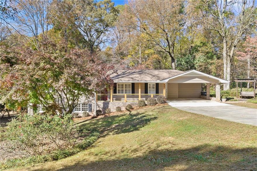 Welcome home to this beautifully updated 3-bed, 2-bath ranch in Lilburn. This home has been completely renovated and has a full basement. One side of the basement has been partially finished, offering a flexible bonus room with plenty of storage space and closet space—perfect for a home office, guest suite, or second den. The other side is unfinished and could be used as a workshop. 
The main floor features an open floor plan with a spacious great room and cozy fireplace that flows into a separate dining area. The kitchen shines with brand-new appliances, tile backsplash, new counters, a stylish coffee bar, and plenty of cabinet space. Enjoy the convenience of an eat-in kitchen with an adjacent laundry area. All bedrooms have new carpet and roomy closets. The primary suite includes a renovated bath with a new vanity, reglazed tile, and a sleek glass shower door. The secondary bath is equally impressive with new finishes, fixtures with a modern feel. 
Outside, you’ll love the large, flat 0.48-acre lot with an expansive deck—ideal for grilling, play, pets, and entertaining. The location is unbeatable: just a short stroll to Old Town Lilburn, with its beautiful park, greenway for walking/running ,shops, and restaurants. Enjoy all that Lilburn offers from, from concerts and festivals to food truck nights and holiday celebrations. This home is located in the desirable Arcado Elementary, Trickum Middle, and Parkview High school cluster.  Additionally, it is minutes from Lawrenceville Highway (US29) where you will find even more convenience with nearby grocery stores, restaurants and more. Come see for yourself all this home has to offer.
