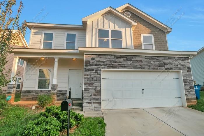 Available Now! This spacious 4-bedroom, 2.5-bath home in the Charleston Walk subdivision offers comfort and convenience. Located within walking distance of McDonough's shops, restaurants, and grocery stores, it's ideal for everyday living. The double garage provides plenty of space, while the garden tub and outdoor area are perfect for relaxing or hosting friends. A great blend of practicality and charm! Your pets are welcome, and the monthly rent is $1,890. Utilities not included. **AVOID RENTAL SCAMS: Rental fraud happens every day; protect yourself! Never wire cash or send gift cards for payments or deposits.