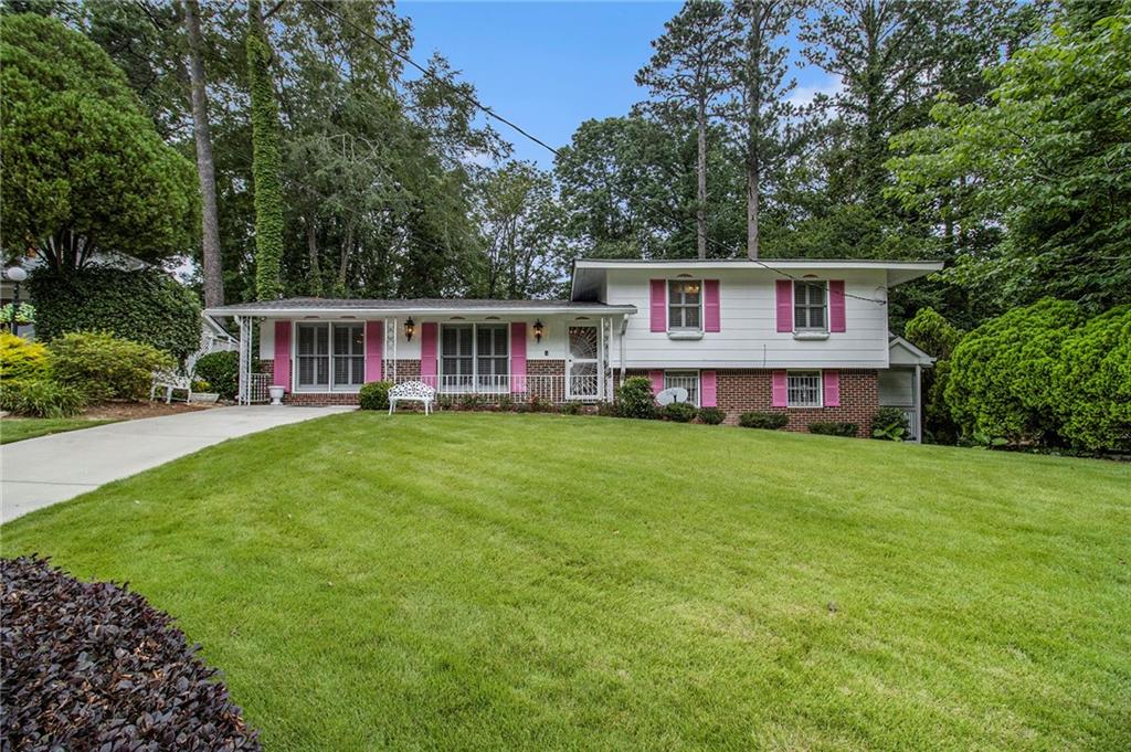 Updated and pristine, this 4-bedroom, 3-bath home on a quiet cul-de-sac has all the bells and whistles! Enjoy new flooring, upgraded light fixtures and fans, a beautifully updated kitchen, and a large separate dining room. Upstairs features three spacious bedrooms and two full baths, while the finished lower level offers a walk-out bedroom with an attached sitting area or office, an additional flex room perfect as a bedroom or movie room, and a generous second living space. With well-maintained landscaping and thoughtful upgrades throughout, this home is a true must-see!