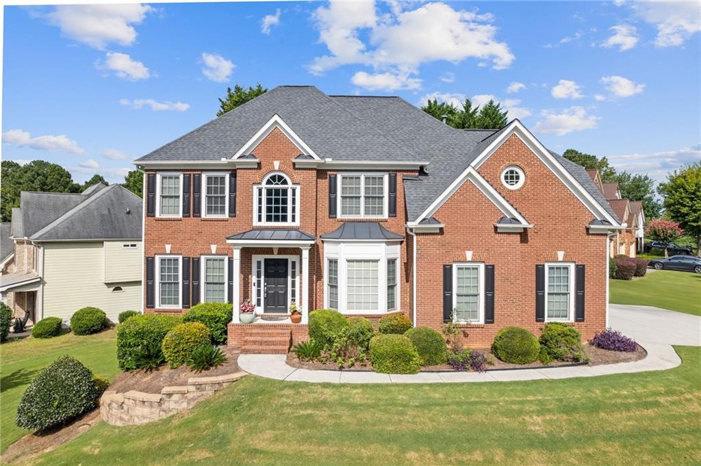Located in the desirable Oakbrooke at Hamilton Mill community, just minutes from I-85, this spacious 6-bedroom, 4-bathroom FRESHLY PAINTED airy home offers exceptional space, comfort, and functionality across three levels.
The main level features an inviting dramatic two-story foyer, formal living and dining rooms, and a bright, newly carpeted family room with direct views into the BEAUTIFULLY REMODELED DREAM KITCHEN. This kitchen includes a custom island, walk-in pantry, and plenty of space for cooking and gathering. A guest bedroom and full bathroom on the main level provide added flexibility.
Upstairs, a catwalk overlooks the main level and leads to the oversized primary suite with tray ceilings, a cozy fireplace, and a LUXURIOUSLY REMODELED ENSUITE BATHROOM. The primary bath includes dual separate vanities, a frameless glass shower, soaking tub, and a REDESIGNED AND EXPANDED WALK IN CUSTOM CLOSET. Three additional secondary bedrooms and a full bathroom complete the upper level.
The partially finished basement level offers a large recreation room, one additional bedroom, an office and a full bathroom—ideal for guests, a home gym, or multi-generational living. Enjoy outdoor relaxation or entertaining on the back deck overlooking the yard.
As part of Hamilton Mill, Oakbrooke residents enjoy access to resort-style community amenities including two clubhouses, Junior Olympic-sized pools, 14 lighted tennis courts, pickleball courts, basketball and volleyball courts, walking trails, playgrounds, and a private fishing lake. There are also year-round social events and sports leagues—perfect for active, connected living.
This is a rare opportunity to own a beautifully designed, spacious home in a vibrant, amenity-rich community. Schedule your showing today!
Discounted rate options and no lender fee future refinancing may be available for qualified buyers of this home.