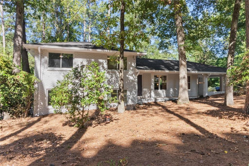 This stunning 4-bedroom, 2.5-bath home in the desirable Briarmoor Manor is a true gem! With its beautiful renovations and modern curb appeal, it’s sure to impress even the most discerning buyers. The freshly painted exterior and serene landscaping create an inviting atmosphere that welcomes you from the moment you arrive. This home truly stands out with its vibrant personality and colorful charm—definitely a refreshing departure from the typical gray and white palettes! As you step inside, you'll be greeted by an abundance of natural light that highlights the refinished hardwood floors, fresh paint, new windows and updated fixtures throughout. The eat-in kitchen is spacious and functional, featuring ample cabinet and counter space, along with sleek stainless appliances. Outdoor enthusiasts will love the large private lot, complete with a terraced backyard that’s perfect for entertaining or simply enjoying nature. This property seamlessly blends indoor comfort with outdoor beauty, making it an ideal retreat! Upstairs, you'll find everything beautifully updated! The primary suite offers two custom closets and a stylishly renovated bathroom, providing a perfect retreat. Two additional bedrooms and another full bath complete the upper level, offering plenty of space for family or guests. The finished terrace level adds even more living space, featuring a large rec room, an extra bedroom, an updated full bath, and a lovely sunroom—ideal for entertaining or accommodating guests. With a new HVAC system and water heater installed in 2022, this home ensures year-round comfort and peace of mind. It's truly a perfect blend of style, functionality, and modern convenience!     

With easy access to 285 and 85, and close proximity to Emory, the CDC, and the VA, this home is in an ideal location. Just steps away from the Briarmoor Pool and close to Hawthorne Elementary, it’s perfect for those who love an active community. Don’t miss your chance to make this stunning home yours!