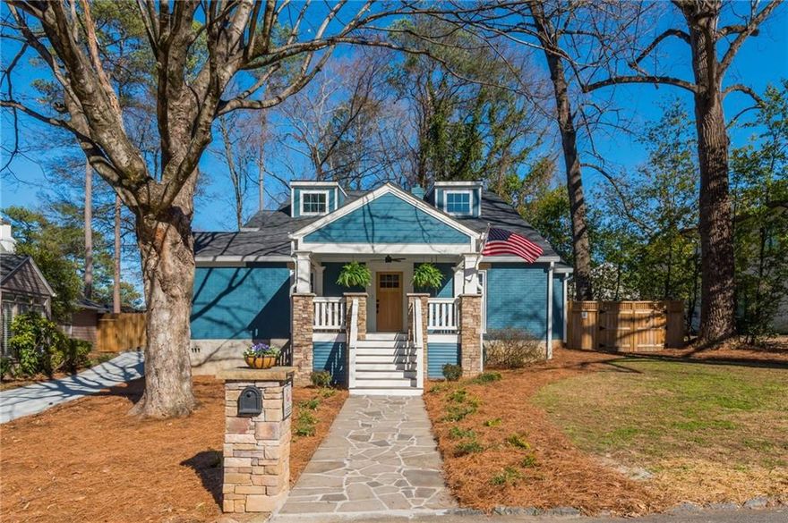 Located in one of Atlanta’s most vibrant and convenient neighborhoods, this beautifully expanded and completely renovated bungalow blends historic charm with modern convenience. Providing 5 bedrooms, 3.5 bathrooms, two spacious living areas, and a dedicated office, this home offers an ideal layout for today’s lifestyle. The inviting curb appeal and welcoming front porch with a classic swing set the tone for the warmth and character that await inside. Step into the formal sitting room that flows right into the heart of the home. The gourmet kitchen, featuring sleek countertops, a 6-burner gas range, updated cabinetry, and pantry is open to the family room and dining space. A 9.5 foot oversized island seats 6, giving this home functionality for everyday living or entertaining a crowd. A main-level primary suite offers a peaceful retreat with a spa-inspired bath, including a tiled shower, soaking tub, dual vanities, and a generously sized walk-in closet. Additionally, there is a dedicated office space with gorgeous natural light. A secondary bedroom and full bathroom, also on the main floor, are perfect for guests or additional office space. Upstairs, you’ll find three additional generously sized bedrooms with great storage, a full bathroom, and a large laundry and utility room for added convenience and storage. Gorgeous hardwood flooring and high-end finishes throughout the home including quartz countertops and custom cabinetry in all bathrooms. Step outside to a fully fenced backyard oasis, complete with multiple entertaining areas. Whether you're hosting a gathering or winding down after a long day, the detached screened-in porch provides true Southern comfort. Enjoy the charm and lifestyle of Loring Heights, a true hidden gem, with its neighborhood pond, playground, dog park, and walking trail, all just minutes from Midtown, Buckhead, and major interstates (I-75/I-85).