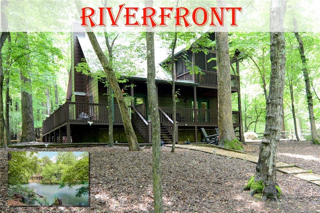 Welcome to your dream getaway in the coveted, gated mountain community of COOSAWATTEE RIVER RESORT! This beautifully rustic RIVERFRONT home offers panoramic views and direct access to the rushing river right from your backyard perfect for fishing, kayaking, or simply soaking in the serenity. Inside, you’ll find an OPEN-CONCEPT layout with warm wood finishes, a vaulted ceiling, and a cozy LOFT overlooking the main living area. Two oversized bedrooms provide comfort and privacy, while multiple decks, a SCREENED PORCH, and a wraparound porch invite you to enjoy the outdoors year-round. The FENCED yard is ideal for pets or play, and a whole-house GENERATOR offers peace of mind. Newer HVAC system. This home is equally suited for full-time living, a weekend retreat, or a lucrative SHORT-TERM-RENTAL. Located just minutes from the charming shops and restaurants of downtown Ellijay, yet tucked away enough to feel like your own private mountain escape. Enjoy all that Coosawattee has to offer: multiple clubhouses, pools, tennis courts, stocked fishing lakes, and endless recreational activities. You can see more about the community on the Cossawatee River Resort web site (google it). Don’t miss this rare opportunity for RIVERFRONT living in the North Georgia mountains at a great price compared to recent comparable sales. Don't miss the boat: 100K+ discount over previous listing and priced way below other riverfront comps. Make an offer today!
