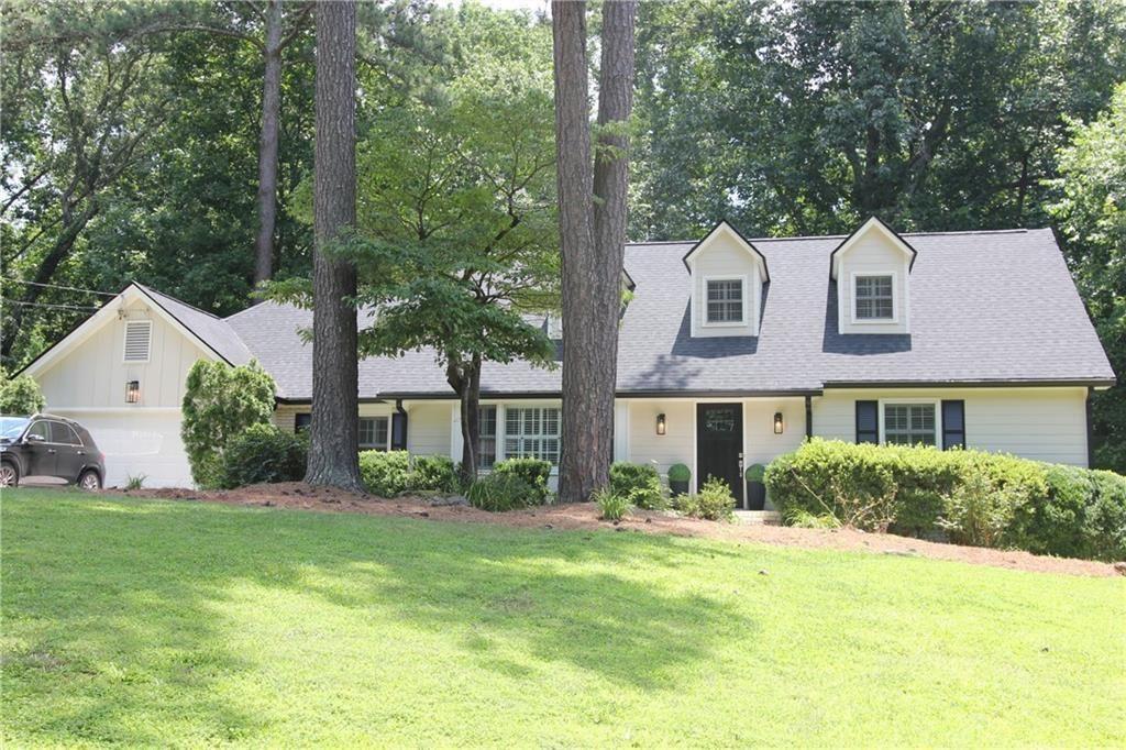 Total Renovation and Remodel! Charming Cape Cod in the heart of Sandy Springs with no HOA and a finished basement with a Gourmet Kitchen! This fully renovated 6-bedroom, 3-bath Home was designed with multi-generational living in mind. Inside, you will find two primary suites-one on the main floor and one upstairs-ideal for guests, in-laws. Everything has been completed for you. New Roof and Gutters, 2025 HVAC, fresh paint, two new kitchens and 3 new bathrooms - fully move in ready. Main Floor Highlights: three spacious bedrooms and one full baths Renovated chef's kitchen with new appliances and countertops, Family Room, Living room and large Deck. Upstairs are two bedrooms and one full bathroom. Basement Perks: Includes a private bedroom, full bath and a kitchen with its own entry-perfect for guests, an au pair, or rental income potential. Storage is abundant throughout the home and garage. New refinished White Oak Hardwood Floors and Plantation Shutters throughout. Speaking of the garage, you will love the new floor and the new EV charging station. This neighborhood offers Pool and Tennis Membership at Seville Chase and Princeton Square. Residents can join the swim team and the tennis activities. It has sidewalks and street lights. We have 2 lovely parks within a 1 1/2 miles, the Chattahoochee River Trails, and Lost Corner preserve for walking, jogging or just enjoying nature. We are close to the Sandy Springs city hall and performing arts center as well as many restaurants, shops and great grocery stores like Whole Foods and Trader Joe's. Highways I400 and I285 are easily accessible along with hospitals and the Marta North Springs station. Close to the new $99 million dollar renovated North Springs High School,