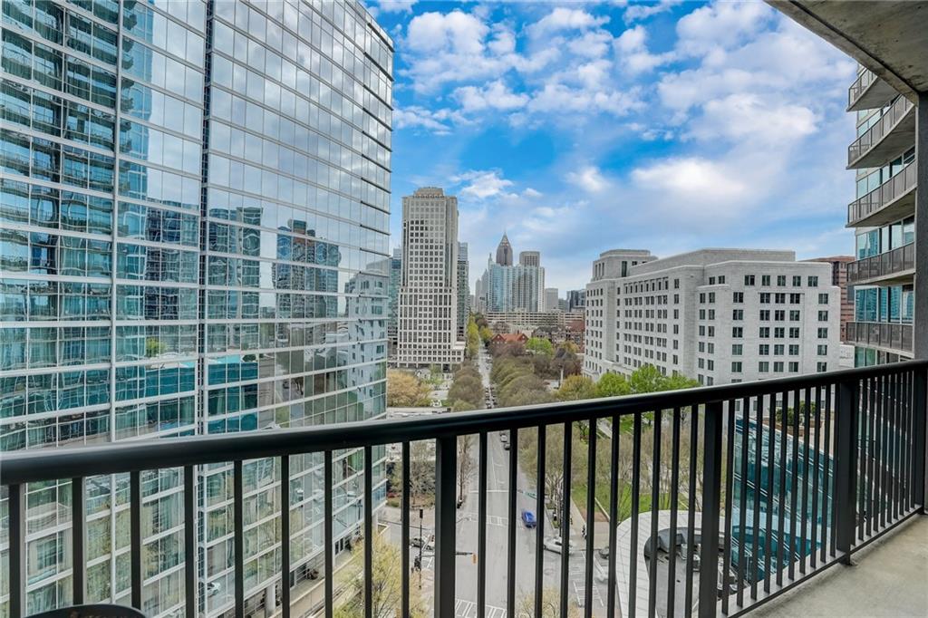 Elevate your urban living experience with one of the only exclusive units boasting a south-facing, unobstructed, and utterly breathtaking city view at 1010 Midtown Condominiums in the heart of Midtown Atlanta! As you enter, be captivated by the floor-to-ceiling windows that flood the space with natural light, enhancing the modern charm of this meticulously designed residence. The open-concept living area seamlessly flows into a chef's kitchen, complete with a full appliance package, granite countertops, and ingenious storage solutions. Retreat to the primary bedroom, a sanctuary of relaxation which features walk-in closet adorned with custom built-ins. The bathroom boasts both a rejuvenating shower and a relaxing soaking tub. Imagine sipping your morning tea or coffee on your private balcony while the city below comes to life. Indulge in the lavish amenities offered at 1010 Midtown, including a heated saltwater pool, a state-of-the-art fitness center, and a recently remodeled club room, all complemented by a 24/7 concierge service. Exciting developments are underway, with a total remodel of the SkyPark and Pool area, featuring water features, outdoor dining and sitting areas, gas grills, and an outdoor fire pit—perfect for cool evenings under the stars. Nestled in the heart of Midtown Atlanta, enjoy easy access to world-class dining, cultural attractions, and vibrant entertainment options, all with a walk score of 90. Piedmont Park, The Beltline, The Fox Theatre, Atlanta Botanical Garden, and countless other landmarks are just steps away. Included with this extraordinary unit are one premium covered parking space and a separate in-demand deeded storage unit—adding convenience and value to your urban lifestyle. Don't miss this unparalleled opportunity to immerse yourself in the essence of sophisticated city living at 1010 Midtown.