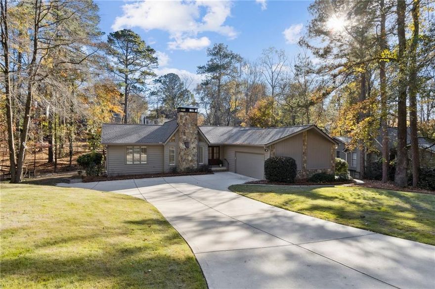 Amazing, newly renovated, sun-drenched ranch in coveted Horseshoe Bend—where designer finishes meet effortless living and convenience. Perfectly positioned on a quiet double cul-de-sac, this gorgeous master-on-main home pairs outstanding craftsmanship with an inviting warmth and lovely natural light. Enjoy quick access to highly rated schools, plus shopping, dining, and entertainment.

Curb appeal shines with a brand-new double entry door, plantation shutters, newer driveway and brand new architectural roof. 
Inside, gorgeous, newly refinished hardwoods flow throughout the main level. The heart of the home is a showpiece kitchen with quartz countertops and matching full-height backsplash, high-end appliances, a custom walnut hood, under-cabinet lighting, and beautiful cabinetry. A stunning butler’s pantry elevates everyday living with statement-making green cabinetry, apron sink, black honed countertops, built-in microwave, wine fridge, and custom shelving.

The primary suite on the main level is a serene retreat with a custom master closet and a spa-caliber bath featuring a custom vanity, frameless shower glass, and radiant heated floors. A designer powder room on the main level is a true jewel box with beautiful vanity, stylish wallpaper and gorgeous sconces. Two additional bedrooms on the opposite side of the home offer privacy, generous closets, and a beautifully finished shared bath.

The terrace level expands your lifestyle with a spacious great room and custom bar area, two additional bedrooms, and a huge unfinished space for storage, gym, or workshop. A walk-out door opens to a new concrete terrace patio, leading to an amazing, flat, mature, low-maintenance backyard—perfect for relaxing or entertaining. 

Horseshoe Bend is an amenity-rich neighborhood with optional golf, tennis, and swim. This top-to-bottom renovation is turnkey, stylish, and smart—every detail carefully curated. Welcome Home!