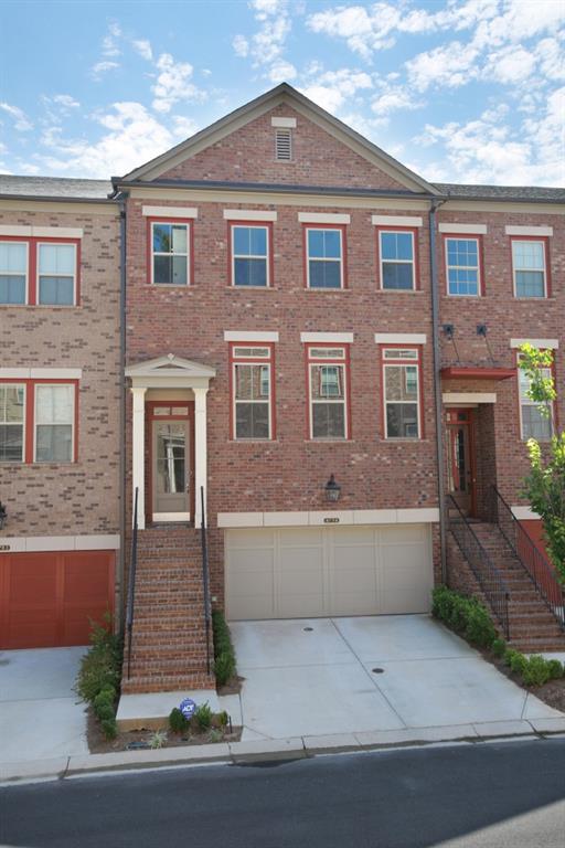 Best location and beautiful pool view in The Gramercy gated townhome community in sought after Perimeter/Dunwoody location steps from some of Atlanta's best shopping, restaurants and Perimeter business district! Quality abounds in this magnificent 3-bedroom, 3.5-bath home with upgrades galore. The fabulous kitchen features a waterfall center island, quartz countertops, gas cooktop with custom hood and mosaic backsplash, and a top-of-the-line refrigerator. Relax in the open concept family room with state-of-the-art stacked-stone fireplace. Oversized master has adjacent sitting area, luxurious spa-like bath and nearby laundry room w/washer and dryer. Terrace level with additional family room, bedroom and bath offers perfect privacy as a teen suite, in-law suite, or guest retreat. Storage abounds with closets, closets, closets and a spacious two-car garage. Enjoy two porches; take in the lush landscape and pool on beautiful covered deck from main level, and terrace-level patio just steps from the pool. TV's remain in both dens. Welcome Home!