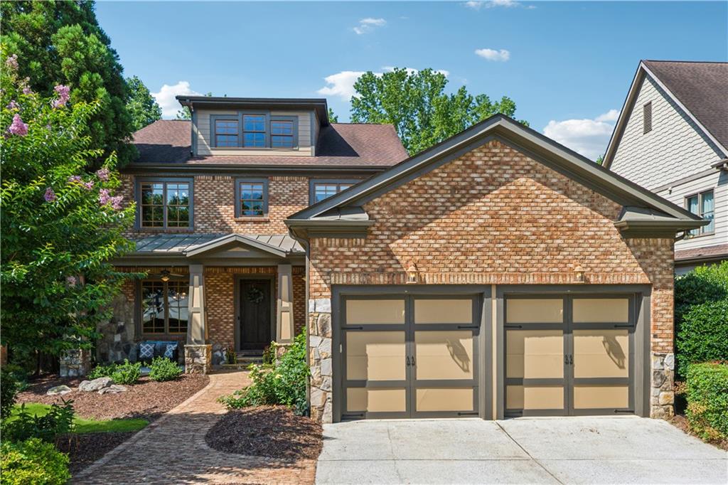 Discover this exceptional, beautifully updated residence nestled within the highly sought-after gated community of Wentworth Manor. Located in South Forsyth County—renowned for top-tier schools and low property taxes—this stunning 5-bedroom, 6-bath home offers spacious, open-concept living spaces designed for both everyday comfort and memorable entertaining.
As you approach the covered brick porch, you'll be greeted by freshly refinished hardwood floors that flow seamlessly throughout the main level. To your left, enjoy a generous dining room adorned with elegant wainscoting and crown molding, perfect for hosting family gatherings. To your right, the versatile main-level bedroom, featuring custom molding and glass French doors, provides an ideal space for multigenerational living or a private home office.
The expansive, open-concept living area is thoughtfully designed to promote a smooth flow between spaces while maintaining individual character. The family room features a striking floor-to-ceiling stacked stone fireplace and beamed ceiling, creating a warm and inviting atmosphere. The gourmet kitchen is truly the heart of the home, boasting a large eat-in island, custom cabinetry, granite countertops, stainless steel appliances—including a 6-burner gas cooktop with vented hood and double wall ovens—and a spacious walk-in pantry.
Adjacent to the kitchen, the charming keeping room with vaulted ceiling and brick fireplace offers a cozy retreat and easy access to the private screened-in deck. The level, fenced, wooded backyard provides a tranquil outdoor setting, ideal for relaxation or entertaining guests.
A practical mudroom at the garage entry helps keep your home organized. Upstairs, the luxurious master suite features a sitting area with a brick fireplace, tray ceiling, and a spa-inspired bath with granite countertops, custom cabinetry, a whirlpool tub, and a large walk-in closet with windows. Three additional spacious bedrooms, each with their own bathrooms, along with a well-appointed laundry room with custom cabinetry, complete the upper level.
The generous walk-out lower level offers approximately 2,000 square feet of versatile space, perfect for multigenerational living or personalized customization. Featuring large windows that flood the space with natural light, a rough-in for a full bath, and endless potential, this area invites your creative vision.
Enjoy the serenity of the private, landscaped backyard—an ideal setting for relaxation or entertaining in a peaceful, wooded environment. This meticulously maintained and updated home showcases fresh paint throughout, extensive molding, 10-foot ceilings, and numerous high-quality upgrades.
Conveniently located within walking distance to top-rated Lambert High School, South Forsyth Middle School, Publix, shopping, and a variety of dining options, this home combines convenience with comfort. Welcome to your dream home in a wonderful gated community—your new chapter begins here!