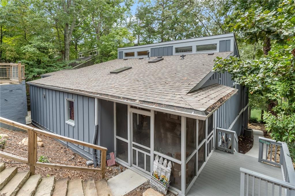 Gather around for large family meals overlooking gorgeous lake views, spectacular sunsets, and abundant wildlife. The most difficult decision you'll make in this home is where to have your morning coffee with three decks, a covered porch, a master sitting room, two huge open living rooms, and lake views from almost every room. Large open spaces sparkle with abundant sunlight through walls of windows and skylights. Vaulted ceilings and new designer touches highlight this custom remodel. Bring the whole family with five different spaces for sleeping, including a bunk room and loft. Looking for a little privacy or an opportunity for more income? The terrace level has a new sidewalk leading to a very private, separate entrance. With no rental restrictions, this home could be used as a permanent residence, a second home, a rental property, or a combination of uses year-round. Enjoy one of the most charming neighborhoods in Lake Arrowhead, beautifully situated amongst the trees in a gorgeous, affectionately named turtle cove, perfect for barbecuing on your large party deck, swimming, paddle boarding, fishing, or launching your boat from your private dock with two slips - a commodity in high demand here in Lake Arrowhead. Hop in the car and you're just four minutes from golf, swimming pools, tennis, pickleball, parks, trailheads, concerts, a restaurant, and events of all types. Schedule your showing today to not miss another day of instant equity and year-round bliss.