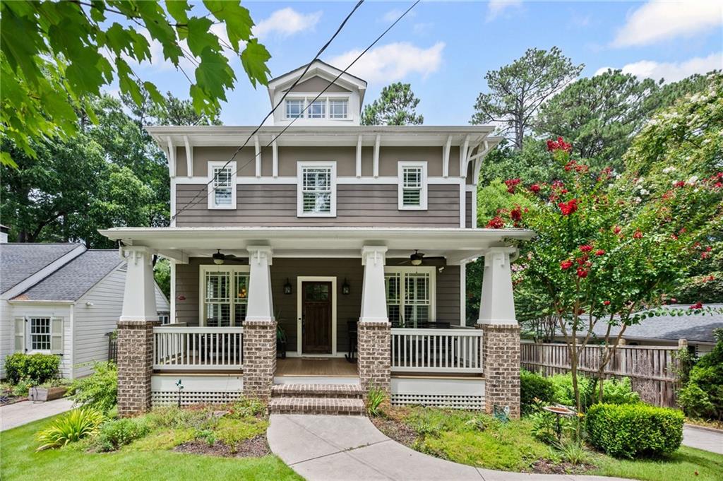 Welcome to your dream home, where Southern charm and modern elegance seamlessly blend to create the perfect sanctuary. As you approach the charming rocking chair front porch, imagine sipping your morning coffee and greeting the day. Step inside to discover stunning hardwood floors that lead you to a spacious room nestled at the front of the home, ideal for remote work or study. The family room, featuring built-in bookshelves, invites cozy evenings by the fire, while the eat-in kitchen boasts granite countertops, a breakfast bar with a view, and top-of-the-line stainless steel appliances, including 6-burner gas cooktop, double ovens and a hood vent. A butler's pantry elegantly connects the kitchen to a separate dining room, perfect for entertaining. On the main floor, a full bath and bedroom offer convenience and versatility for guests or multi-generational living.
Venture outside through French doors to a screened-in back porch, where you can enjoy cool fall evenings or step onto the grilling deck for outdoor gatherings. The expansive, fenced-in backyard is ideal for pets and play alike. Upstairs, the oversized primary suite is your private haven, complete with a covered balcony—a serene escape for reading or relaxing. The luxurious en-suite bath features a soaking tub, double vanities, and a waterfall showerhead, alongside an extra-large walk-in closet. Two spacious secondary bedrooms provide ample room for family or guests. Additionally, the fully finished basement with a full bath offers endless possibilities for recreation or additional living space. This home is more than just a place to live—it's a lifestyle waiting to be embraced.