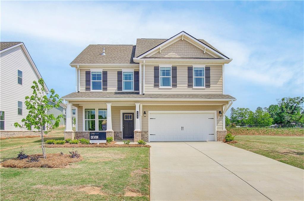 Introducing Homesite 40, the stunning Devon Plan within the luxurious Cooper Park Community of McDonough, GA. This remarkable 4 bedroom, 2.5 bath property features a spacious open concept kitchen, complete with a large island that overlooks the breakfast area and family room—perfect for entertaining and family gatherings. The stylish design includes quartz countertops, stainless steel appliances, and a chic backsplash that elevates the culinary experience. The generous primary suite serves as a luxurious retreat, boasting a walk-in closet and a private en suite bathroom featuring a dual vanity, a relaxing tub, and a walk-in shower adorned with elegant tile. Each bathroom in the home showcases solid surface countertops for both style and functionality. For added versatility, the home includes a bonus room on the third level, which can be transformed into a fifth bedroom or serve as a game room or home office, along with an additional full bath. Plus, the home features a basement, providing even more space for storage or future customization to suit your lifestyle. Located conveniently close to Interstate 75 and a wealth of shopping and dining options, this home is situated in the sought-after Dutchtown School District. The community amenities enhance your lifestyle, featuring a cabana, swimming pool, playground, dog park, and walking trails. *Stock Photo (not the actual house). Experience upscale living at its finest in this beautiful new plan! Please note: If the buyer is represented by a broker/agent, DRB REQUIRES the buyer’s broker/agent to be present during the initial meeting with DRB’s sales personnel to ensure proper representation. If buyer’s broker/agent is not present at initial meeting DRB Group Georgia reserves the right to reduce or remove broker/agent compensation.