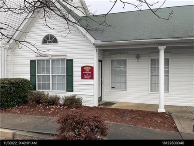 Ground level professional office space for lease. Space includes a reception area, one average size office, two larger office/conference rooms, breakroom/kitchen, bathroom and hand wash sink. Front and rear entry and open parking. Monthly rental price includes everything but electric and internet.