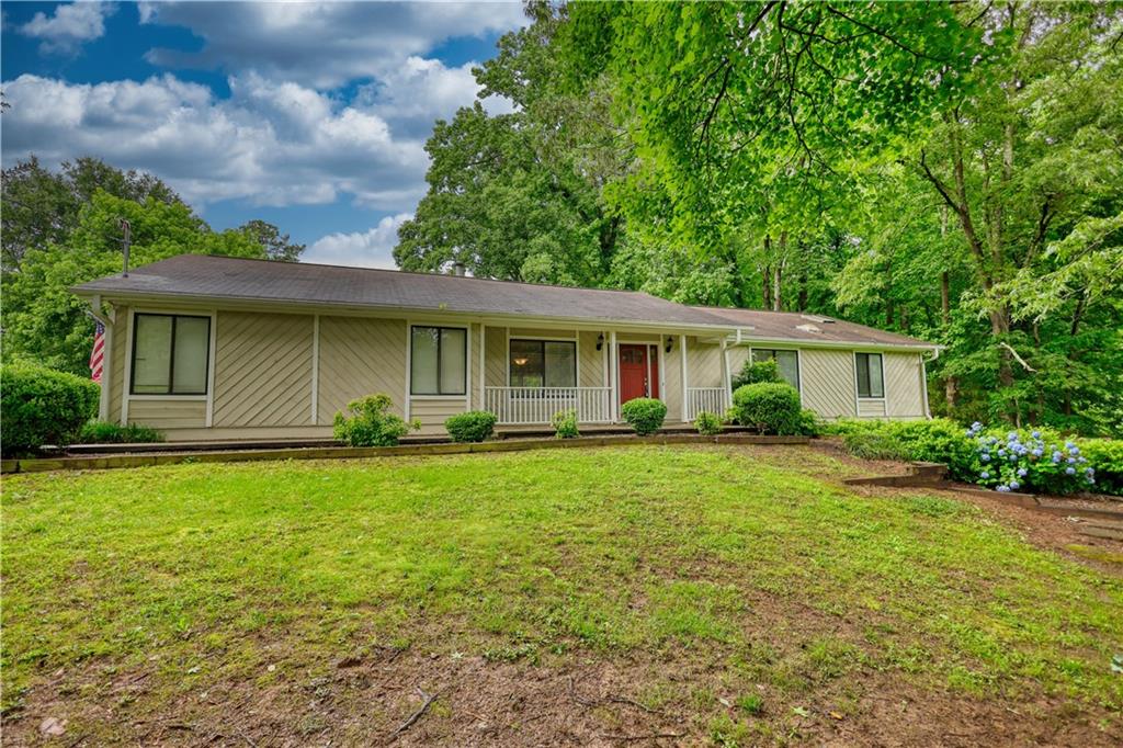 Discover the rare opportunity to lease a fully renovated mini farm nestled on 5 usable acres in one of Alpharetta’s most sought-after locations. This spacious home features 4 bedrooms—2 on the main level and 2 in the finished basement—offering flexibility and comfort for a variety of living arrangements.
Enjoy peaceful mornings on the large back deck overlooking serene, fenced pastures. The property is thoughtfully set up for horse enthusiasts with 3 fenced and cross-fenced pastures, a 50x100 grass riding arena, 7 stalls, a feed and tack room, and an indoor wash rack. Ideal for personal horses, and the landlord is open to a trainer using the property- inquire for additional terms. Landscaping included in rent. Animals welcome with deposit. Just minutes from Wills Park, Dover Saddlery, top-rated schools, and vibrant downtown Alpharetta with its endless dining, shopping, and entertainment options. You truly can’t beat this location!
