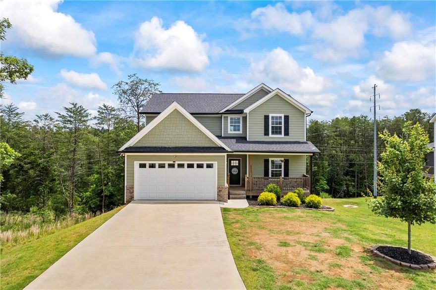 Welcome home! This thoughtfully designed 4 bedroom / 3.5 bathroom home offers comfort, flexibility, and timeless style. The main-level primary suite features double vanities, a spacious walk-in closet, and a serene retreat from the rest of the home. The open-concept kitchen is equipped with stone countertops and flows seamlessly into the living room - centered around a cozy fireplace, perfect for gathering! Upstairs, a generously sized family room provides the ideal space for movie nights, gaming, or hosting guests. Tucked in a quiet cul-de-sac, this home stands out as one of the few in the community with a stubbed, unfinished basement - ready to be transformed into additional living space, a home gym, or a custom entertainment area. Outside features to a covered patio with walk-out access to the backyard, creating the perfect setting for outdoor dining or relaxation. Don't miss out on this stunning home. Schedule your private showing today!
