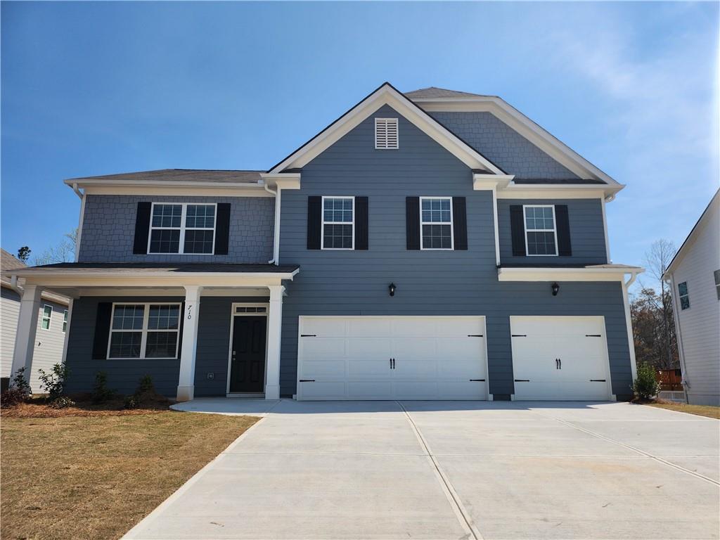 Beautiful one year old Home in Braselton. Private fenced wooded back yard, 5 Bedroom 4.5 Bath. Granite countertop, white cabinet, separate dining room, view to the family room, 3 car garage, loft on 2nd floor. Electric car outlet. Lawn care included in monthly rent.
