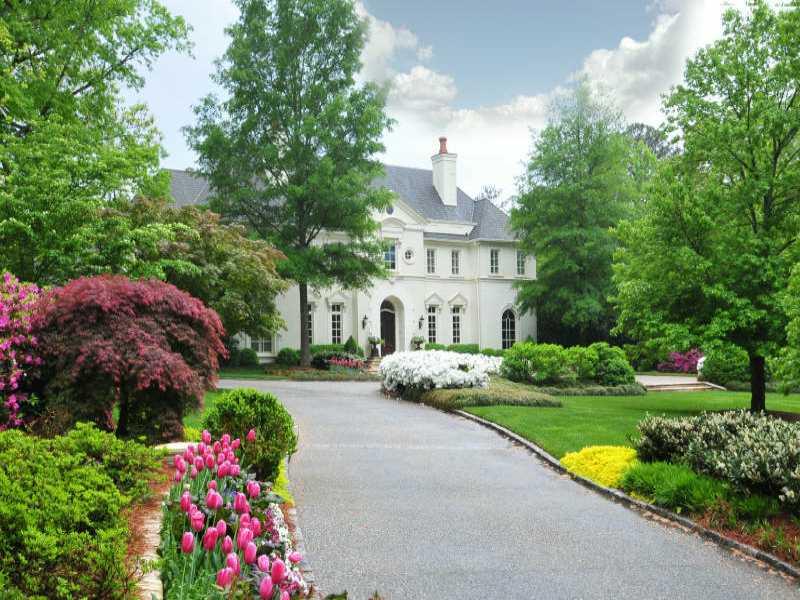 Substantial estate on arguably Buckhead's most prestigious street.Elegant manor home with large and well designed entertaining rooms with light filled family spaces. 1000's of square feet of stone terraces overlook 2 acres that include a sparkling pool, cabana, beautiful lawns and a putting green.