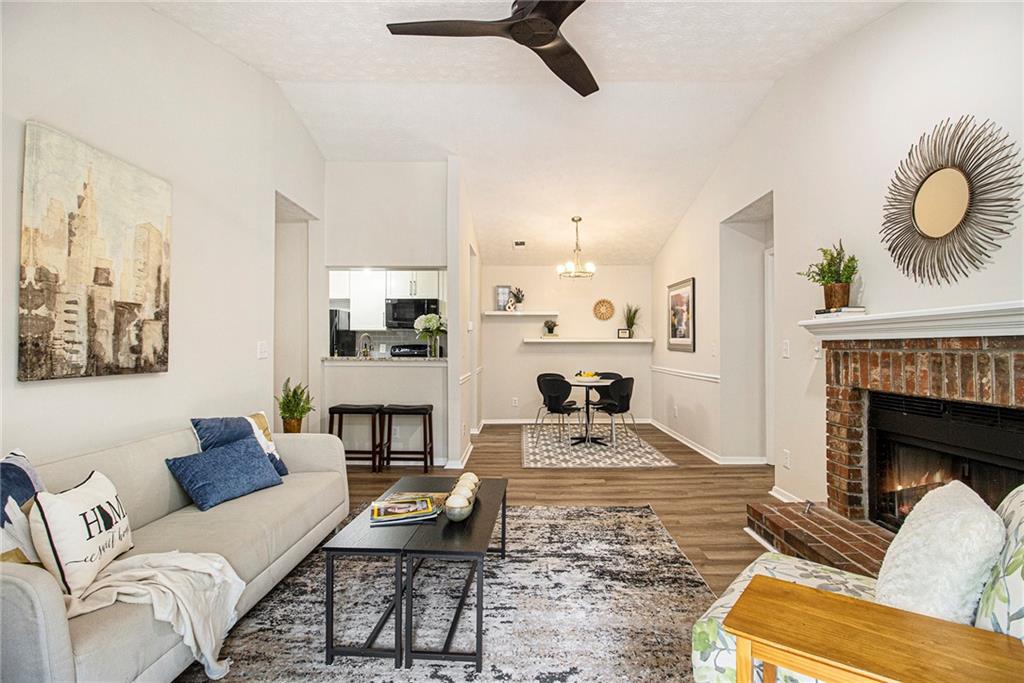 This move-in ready gem in sought-after Tuxworth Springs offers the best of everything: a top-unit FLOOR PLAN with vaulted ceilings; the prettiest LOCATION, tucked away in the wooded back of this unique, gated complex; the best CONDITON, with updated kitchen, baths and lighting; upgraded double-pane windows & patio doors; plus new paint and flooring throughout. The perfect roommate plan, this spacious 2/2 features a full bedroom, bathroom and walk-in closet on each side of the living and dining area. The renovated kitchen was designed by and for the homeowner, which means high-quality cabinets with extra drawers, storage over the sink, and pull-out shelving. The laundry / utility room also boasts tons of space for pantry and storage. Just off the living room, enjoy your own deck for dining al fresco, and another large storage closet. Tuxworth Springs is a beautifully-designed and well-managed community – it’s even FHA Approved. This sprawling, gated neighborhood near the heart of Decatur offers security, beautiful landscaping, space to wander, Little Free Library, ample parking in front of your building and great amenities (pool, tennis and dog walk); all in a rare, natural wooded setting, just minutes from Emory, CDC and the City of Decatur. Tuxworth residents have easy access to a plethora of restaurants and retail just across the street and up and down Scott Blvd., as well as public transport, The PATH bike & hike trails, and ATL’s favorite destinations. You will LOVE living here.