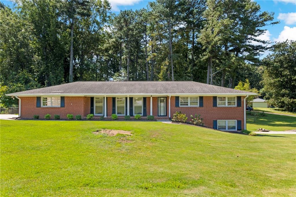 Welcome to this freshly updated brick ranch in a quiet Tucker neighborhood! PEST CONTROL and LAWN CARE are INCLUDED. New giant deck, new paint, new floor, remodeled bathrooms, updated lighting, new HVAC, newer water heater, washer and dryer provided. Easy and private living on an acre of land! Close to Emory, CDC, Mercer. Minutes from Downtown Tucker, shopping, 78 and 285.
Plenty of parking: 2 car carport, 1 car garage, and 2 driveways. Lots of additional storage room in the unfinished basement. Agent is owner.