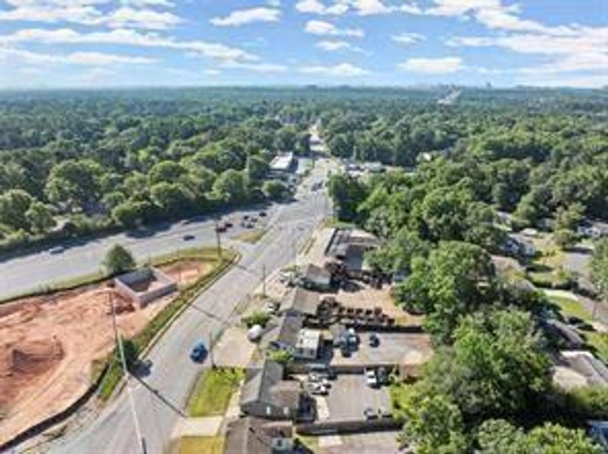 Prime Powers Ferry Location – Endless Possibilities for Your Business! Bring your vision to life in this highly visible property just off Hwy 120 Loop, minutes from I-75, downtown Marietta, and East Cobb. With plenty of rear parking, a welcoming outdoor gazebo, and flexible indoor space, this property is ready to serve a wide range of business needs. Inside, hardwood floors, abundant natural light, and new windows create a bright, inviting environment. A large rear addition offers the perfect setup for a conference room, treatment space, or expanded seating. Whether you’re looking to open a coffee shop, launch a small take-out restaurant, or establish your professional office—chiropractic, contractor, brokerage, or medical—this property delivers the visibility, accessibility, and charm to make it a success. Located in a rapidly growing corridor, it’s an ideal investment to start or expand your business.