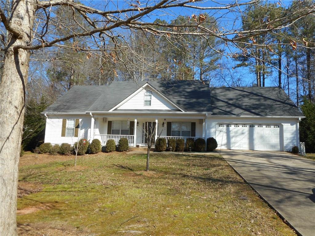 The hard to find 3/2 stepless ranch! This one is beautiful with hardwood floors, plantation shutters. Kitchen has breakfast bar, breakfast room, granite counter tops and tile back splash. Wainscoting throughout. All appliances here including front loading washer and dryer. Very well maintained and loved!