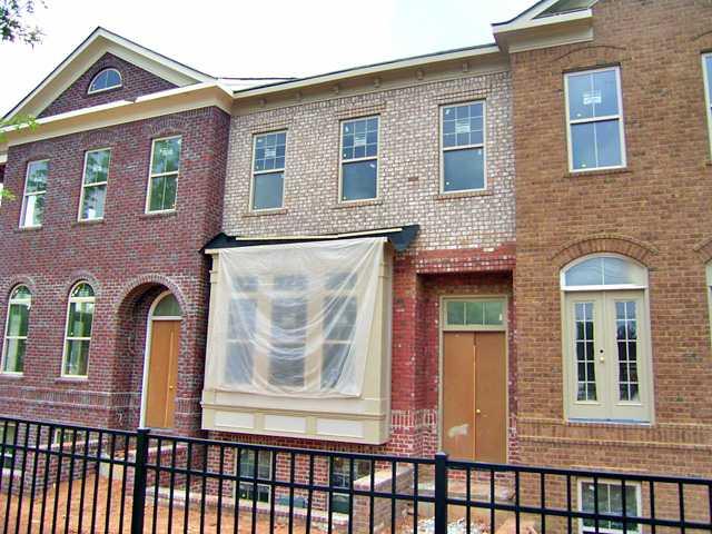 NEW GATED COMMUNITY BY VINTAGE HOMES, LLC. TRADITIONAL TOWNHOMES MINUTES FROM I-285, VININGS & THE MARKET VILLAGE IN SMYRNA. THESE WONDERFUL PLANS COME WITH 3, 4, OR 5 BEDROOMS, HARDWOODS ON MAIN, SS APPL & GRANITE CTOPS. VERY NICE CORNER UNIT.