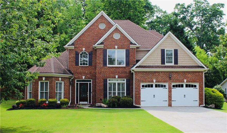 Welcome to 2940 Saddlebrook Glen Drive — a beautifully updated four-bedroom, three-and-a-half-bath home nestled in the sought-after Saddlebrook Glen neighborhood and zoned for award winning, top-rated Forsyth County schools, including Big Creek Elementary, Piney Grove Middle, and Denmark High School.

This east-facing home welcomes you each morning with sunrise light streaming through the gorgeous updated front door. Inside, enjoy the ease of master-on-main living, featuring an oversized primary suite with a sitting area, his-and-hers walk-in closets, and a fully renovated spa-like bathroom with quartz countertops and updated fixtures. The entire main level boasts brand new flooring, plantation shutters throughout, and fresh interior paint, enhancing its open and airy feel.

The heart of the home is an open-concept kitchen and two-story family room. The kitchen features stainless steel appliances, updated countertops, a large walk-in pantry, and a butler’s pantry conveniently connected to the formal dining room. A sunroom at the back of the house offers additional natural light and access to a fenced backyard. Upstairs, you’ll find two bedrooms with a Jack-and-Jill bath, an additional bedroom with its own private full bath, and a bonus room ideal for a home office, kids' playroom, or media space. All upstairs bathrooms feature new countertops and updated fixtures. The home is situated on a large cul-de-sac lot and includes a climate-controlled garage, providing flexible space for a workshop, gym, or studio. Additional upgrades include updated lighting and hardware throughout, fresh exterior paint, an updated garage door, and a sprinkler system.

Enjoy resort-style amenities in the community, including a junior Olympic-sized swimming pool, tennis and pickleball courts, a playground, and direct access to Caney Creek Preserve. Located just minutes from shopping and dining at Halcyon, Avalon, The Collection and Trader Joe’s. Also enjoy the convenience of being close to the Big Creek Greenway, Lake Lanier, and the North Georgia Premium Outlets. The North GA mountains and the airport are just a 45 minute drive away. This location combines serene neighborhood living with unbeatable convenience.

Don't miss this move-in-ready gem in one of Forsyth County’s most desirable communities!