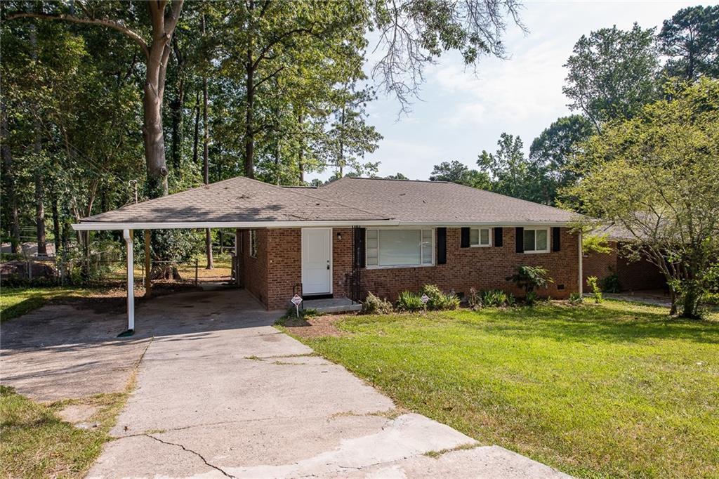 This spacious ranch-style home is packed with value and modern upgrades! Step outside to enjoy the huge rear deck, perfect for summer gatherings and relaxing evenings. Inside, the original hardwood floors add warmth and character, while large windows flood the living room with natural light. The kitchen is a standout, featuring granite countertops, black appliances, and ample cabinet space for all your storage needs.
Located just minutes from Greenbriar Mall, Kroger, MARTA, and more, this home offers both convenience and accessibility. Tenants must meet income requirements not exceeding 120% of AMI.
This property has an income requirement of under 120% AMI. Please see the last photo.