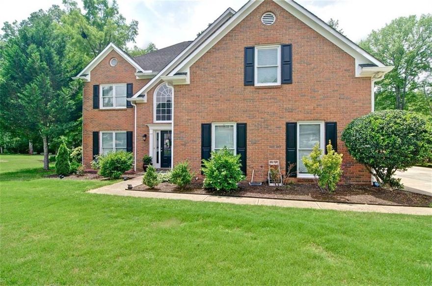 Quiet street, awesome neighborhood in Marietta.Great house that sits off the road and boast granduer and privacy.Completley fenced and private,very well maintained.Many..too many upgrades to list but newer HVAC, windows and roof are some.Formal and informal dining areas,granite tops and openness abound.Tall entry foyer, and the list continues.Very large .50 acre lot(one of the larger ones on the street)Back property lines extend past the fence, Drive up shed, flat green and  large area. Covered decks and sunroom and just a great home for a great family... Did I mention hardwoods throughout??  Dont think it will last so come see it and come make it yours!!