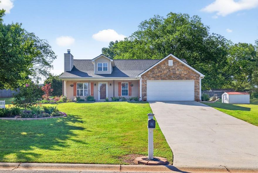 Beautifully Upgraded Ranch on Landscaped Lot with No HOA! Bright Family Room with wood-burning fireplace, opens to Dining Area. Completely remodeled Kitchen: NEW soft-close cabinets, NEW granite countertops, NEW subway tile backsplash, NEW stainless steel appliances, and NEW recessed lighting! Additional cabinets added for storage and coffee bar! Primary Suite boasts trey ceilings, large walk-in closet, lots of natural light, and Ensuite Bath with dual vanity. Two generous Secondary Bedrooms share Full Bath with new vanity cabinet & granite countertop. Outside, enjoy the covered patio overlooking the spacious, landscaped back yard with storage shed! NEW ROOF & UPGRADED FLOORING! Kitchen Refrigerator, Clothes Washer, and Clothes Dryer remain! Enjoy the freedom of no HOA, yet the convenience of a Winder location with easy drive to 85 or 316, plus all of the shops and dining of Winder, Hoschton, and Braselton nearby!