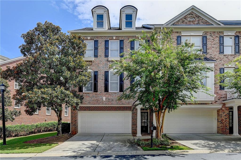 This exquisite end-unit townhome is situated in the highly sought-after Vinings Estates community. Hardwood floors are featured throughout. Enjoy an open and spacious floor plan boasting 4 bedrooms, 3 full baths, and 1 half bath. Additional features include a 2-car garage with extra storage space. The expansive main level showcases an eat-in kitchen, open dining area, sunroom, and private deck access. The top level offers a primary bedroom with sunroom, large walk-in closet, double vanity, separate shower, and tub. Two additional bedrooms and a full bath complete this level. The lower level/walk-in level features a bedroom with full bath. This community boasts an array of amenities, including 3 pools, 2 clubhouses, 8 lighted tennis courts, basketball court, playground, and owner will consider 6-month lease for additional rent. A minimum 650 credit score and no evictions are required.