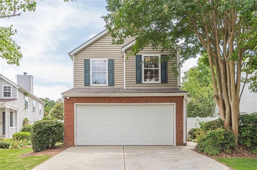 Recently renovated  3-bedroom, 2.5-bathroom home with a 2-car garage in the desirable Cambridge HS District. Awesome  open floor plan, with a kitchen  granite countertops, stainless appliances, and a captivating 2-story fireside family room—Hardwood flooring throughout adds a touch of timeless charm, while the impressive 2-story great room featuring a cozy fireplace invites gatherings and moments of tranquility alike. Full Hardwood flooring and tiles, upgraded kithien and bathrooms upgraded with Granite Counter tops and so many other upgrades. The high ceilings lend an airy feel to the space, enhancing the sense of openness and freedom. Ceiling fans add a touch of refinement throughout.  Private backyard looks really great.  Enjoy community amenities such as swim/tennis, a playground, and sand volleyball court. Just moments away from GA 400, Halcyon, Avalon, downtown Alpharetta, and the greenway.  Whether you're seeking a sanctuary amidst the bustling city life or a hub for entertainment and relaxation, this property offers it all and more. Don't miss the opportunity to make this urban retreat your own - schedule a viewing today, this one will not last long!
