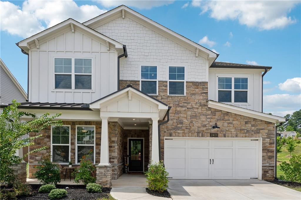Welcome to this stunning 5-bedroom, 4-bathroom home built in 2022—a meticulously crafted ENERGY STAR® PARTNER-built residence by Beazer, where timeless farmhouse charm meets modern luxury and sustainable living. Designed for maximum comfort and minimal utility costs, this home features super-efficient HVAC systems and high-quality building materials, making it a standout choice for eco-conscious buyers. Ideally located in one of Kennesaw’s most desirable communities, this northeast-facing gem is just minutes from Downtown Kennesaw, Kennesaw State University, The Battery, Kennesaw Mountain, and premier shopping destinations. Plus, it’s situated in the award-winning Cobb County school district. Boasting 3,485 square feet of thoughtfully designed living space, this home offers an open-concept layout filled with natural light—perfect for both everyday living and effortless entertaining. The main level includes a full guest suite with private bath, ideal for visitors or multigenerational living, as well as a dedicated office with elegant library-style privacy doors. At the heart of the home is a dramatic two-story great room anchored by a floor-to-ceiling stacked brick fireplace, flowing into the spacious dining area and a chef’s dream kitchen. Here, you’ll find quartz countertops, upgraded Whirlpool appliances—including a 5-burner cooktop with vent hood—an oversized center island, soft-close 42" cabinetry, and a walk-in pantry. A triple sliding, privacy-tinted glass door opens to a covered patio, blending indoor and outdoor living seamlessly while filling the space with light. Upstairs, unwind in the luxurious primary suite featuring dual walk-in closets and direct laundry room access. The spa-like ensuite bath boasts double vanities, a soaking tub, and a frameless glass shower with built-in bench. A versatile loft, two secondary bedrooms with a shared bath, and a fourth upstairs bedroom perfect for guests or a playroom round out the second level. Step outside to a private, fenced backyard oasis and a covered patio with ceiling fan—ideal for year-round relaxation. Move-in ready and loaded with upgrades, this exceptional property offers the perfect blend of style, function, energy efficiency, and location. Whether you’re hosting, raising a family, or simply looking to unwind, this home is a rare find that checks every box. Seller also welcomes a 12-month lease option at $4,250/month.