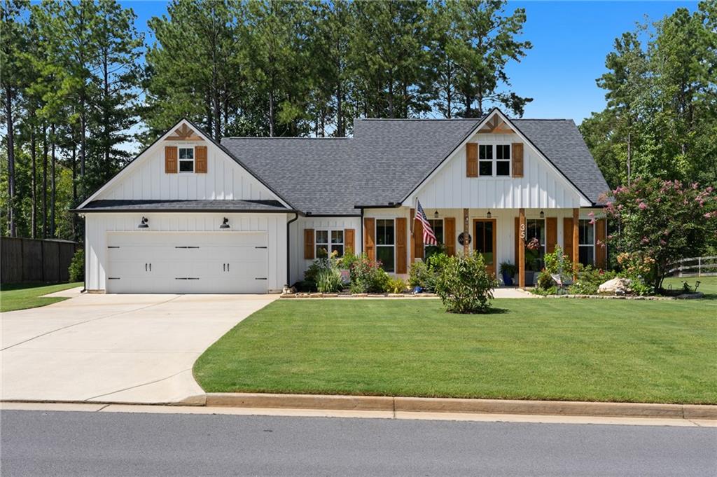Discover this beautiful ranch home situated in Rock Mountain, Georgia! This charming residence features three bedrooms and two bathrooms, perfect for comfort, practicality, relaxation and entertaining.
Step into the gourmet kitchen, which boasts an oversized island, a farmhouse sink, and an upgraded pantry, making it a chef's delight. A window over the kitchen sink fills the space with natural light, while the adjacent living area features a cozy fireplace and built-in bookshelves, ideal for displaying your favorite reads and decor. Custom window treatments add a finishing touch of elegance throughout the home.
The owner's suite serves as a true retreat, complete with a spacious closet and an extended shower for a luxurious bathing experience.
Outside, you'll find a beautifully landscaped yard filled with matured blooms, creating a serene setting. The property also includes a shed for additional storage, all set huge lot providing plenty of space to create your own personal oasis on our extended oversized deck.
Don't miss your chance to make this stunning home your own!
