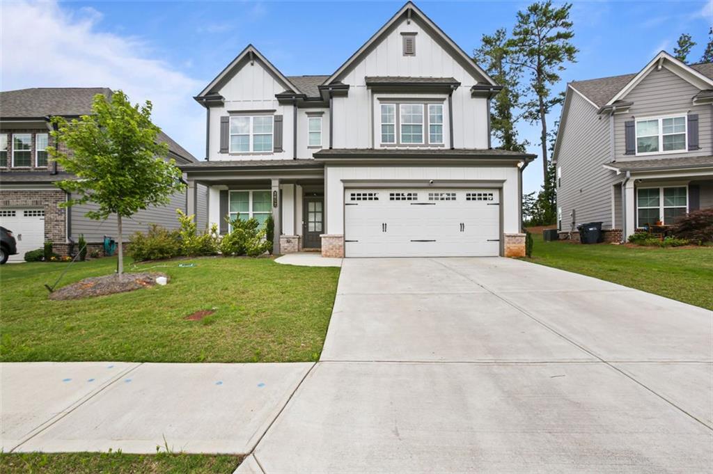 Bright and spacious 4BR/3BA home in the sought-after Peachtree Ridge district! Features include an open-concept layout, hardwood floors, gourmet kitchen with granite countertops and stainless steel appliances, main-level guest suite, and a large upstairs loft. Enjoy a private backyard, patio, and spa-like owner’s suite with double vanities and soaking tub. Close to parks, shopping, dining, and top schools. Apply today before it's too late—this one won’t last!