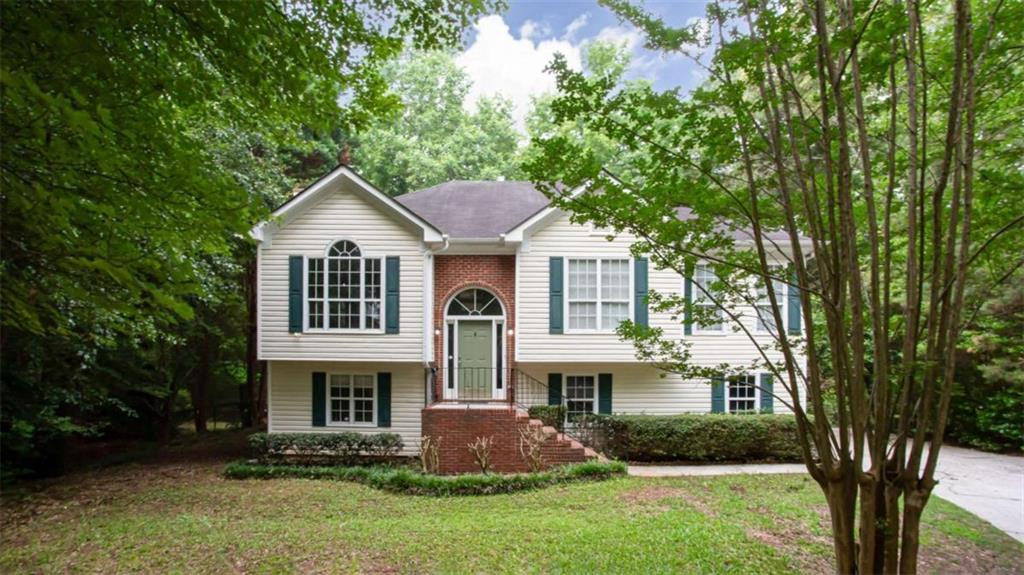 WOW!!! You won't want to miss this Beautiful Home in Sought after Woodland Subdivision in Monroe!! It's a newly renovated 4-bedroom 3-bathroom home with a media room on the lower level, as well as what could be your new man cave or theatre room. Located on a quiet cul-de-sac, this gorgeous wooded lot is a full acre and offers lots of privacy. All new carpeting and paint throughout and a brand new roof, make this home move-in ready. Located just walking distance from Atha Road Elementary School and feeds in to nearby sought after Walnut Grove High School. Woodlake Subdivision is a swim tennis community with Bear Creek Golf course located within the subdivision. Affordably listed, so don't hesitate to schedule your viewing as soon as you can. This will not last long!!