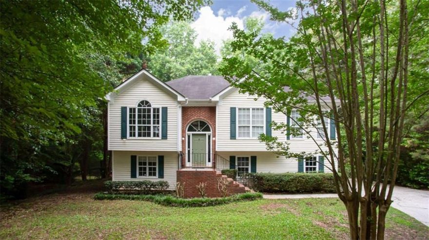 WOW!!! You won't want to miss this Beautiful Home in Sought after Woodland Subdivision in Monroe!!  It's a newly renovated 4-bedroom 3-bathroom home with a media room on the lower level, as well as what could be your new man cave or theatre room. Located on a quiet cul-de-sac, this gorgeous wooded lot is a full acre and offers lots of privacy. All new carpeting and paint throughout and a brand new roof, make this home move-in ready. Located just walking distance from Atha Road Elementary School and feeds in to nearby sought after Walnut Grove High School. Woodlake Subdivision is a swim tennis community with Bear Creek Golf course located within the subdivision. Affordably listed, so don't hesitate to schedule your viewing as soon as you can. This will not last long!!