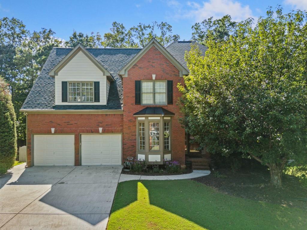 Welcome to this exceptional executive residence offering the perfect blend of luxury, space, and functionality. Boasting seven spacious bedrooms and four and a half beautifully appointed bathrooms, this home is designed to accommodate both large families and high-end entertaining. From the moment you step inside, you're greeted by an elegant floor plan featuring custom finishes, high ceilings, and abundant natural light. The gourmet kitchen on the main level is a chef's dream, complete with premium appliances, granite countertops, and an oversized island, ideal for gatherings. A second full kitchen on the lower level provides added convenience, perfect for multi-generational living or hosting extended guests. The fully finished basement expands the living space dramatically, offering additional bedrooms, a recreation area, and private guest quarters. Whether used for a home theater, gym, or executive office suite, this lower level is both versatile and luxurious. Each bedroom is generously sized, with the primary suite serving as a private retreat featuring a spa-like en-suite bath, fireplace and walk-in closet. Multiple living areas throughout the home provide ample space for relaxation and entertainment. Outside, enjoy a professionally landscaped yard, ample parking, and a serene setting that reflects both prestige and comfort. This executive home delivers sophistication, space, and style -- ready to meet the needs of today's discerning homeowner.