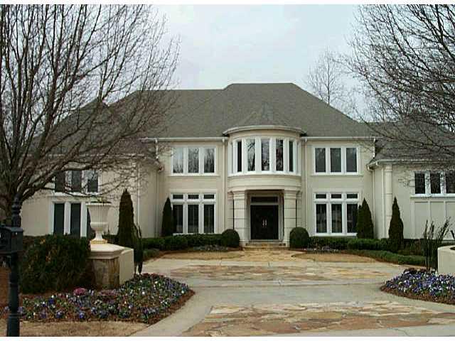 Unique and exquisite is this HC Stucco home on golf course with fantastic views - Elegant MBR suite - Finished terrace level with unbelievable theatre room, 2nd kitchen, billiard room - Inground Infinity pool with veranda - Many extras - A pleasure to show!