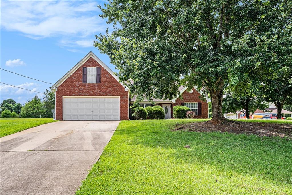 Charming Ranch on Corner Lot in Sought-After Ola School District! Welcome to this beautifully maintained 3-bedroom, 2-bath ranch home nestled on a spacious corner lot in one of the most desirable school districts—Ola! Boasting a generous layout with a 2-car garage, this home offers comfort, flexibility, and peace of mind with major updates already taken care of. Step inside to discover a bright and open floor plan, perfect for entertaining or cozy nights in. The large bonus room provides endless possibilities—create your dream home office, vibrant playroom, guest retreat, or a creative studio space. The updated HVAC and water heater (both under 5 years old) ensure efficiency, and the lifetime roof means you’ll have worry-free living for years to come. Enjoy outdoor living with a large yard that's perfect for family fun, gardening, or even future expansion. Whether you’re looking to settle into a quiet neighborhood or invest in a home with lasting value, this property delivers. Sellers are motivated and have already moved out—this home is ready for its next chapter. Don’t miss your chance to own this gem in the Ola community!