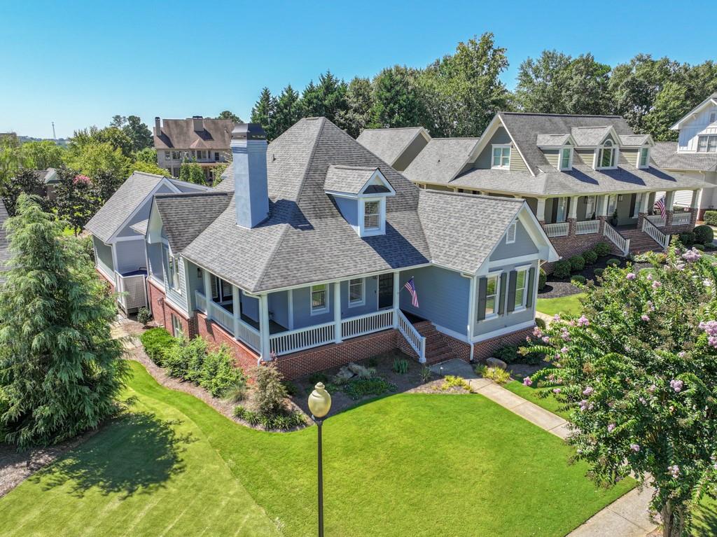 This beautifully updated home in the coveted Village at Chateau Elan offers the perfect blend of elegance, comfort, and resort-style living.
On the main level, you’ll find a renovated kitchen with breakfast area and adjoining dining space, open to an oversized family room with fireplace—a true centerpiece for gatherings. The primary suite on the main features direct porch access and a renovated spa bath with a rare stone soaking tub that stays warm longer for ultimate relaxation.
Upstairs, a huge game/media room and a private bedroom with full bath create the ideal retreat for family or guests.
Step outside to enjoy a spacious back porch overlooking the grounds, plus a deck with a hot tub for evening unwinding. The property has been newly landscaped, with fresh exterior and interior paint, and is meticulously maintained inside and out.
The separate carriage house apartment provides even more flexibility, complete with a full bedroom, full bath, generous closet space, and its own water heater—perfect for extended guests, a teen suite, or private office.
This property also features a covered golf cart bay, a level driveway (rare and highly sought-after!), and an unfinished basement for storage or future expansion.
Located in the gated, golf-course community of Chateau Elan, this neighborhood is truly one-of-a-kind. With world-class amenities including multiple championship golf courses, winery & resort, clubhouse dining, tennis, pickleball, and more, it’s no surprise that people vacation here—yet you can call it home. Yard maintenance is included, giving you true lock-and-leave luxury in one of the most desirable communities in Georgia.