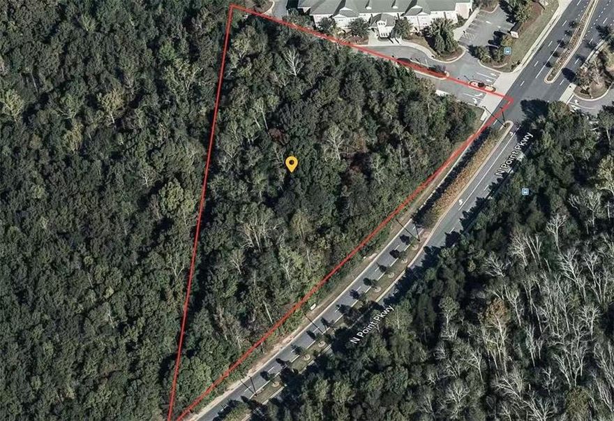 GPS address:4081 North Point Pkwy,Alpharetta, GA 30022.Rare Commercial Lot in Alpharetta! Approximately 3.055 acres on North Point Parkway,off Old Milton Parkeay. Only 0.5 miles from GA-400 Exit 10! One mile to Avalon | Two miles to Downtown Alpharetta | Three miles to North Point Mall | Two miles to Big Creek Greenway | Three miles to Ameris Bank Amphitheatre. Surrounded by Fortune 500 & top tech companies including Microsoft, SAP, AT&T, T-Mobile, Wells Fargo, ADP, Fiserv, Equifax, LexisNexis, BitPay, Ciox Health, Colonial Pipeline, Jackson Healthcare & more! With immediate access to GA-400 and proximity to Alpharetta’s premier business, retail, and lifestyle destinations, this site represents a rare opportunity for investors and developers seeking high-visibility land in one of Metro Atlanta’s most dynamic corridors.(Fulton County Tax Parcel ID: 12-311009110483)