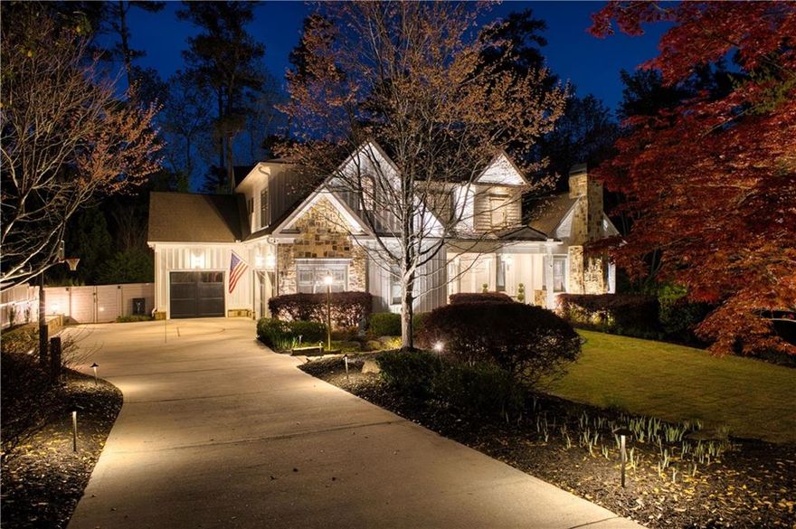 This immaculate executive home in beautiful Brookhaven is equipped with the most sought-after combination of features designed to deliver effortless indoor/outdoor living paired with elegance and sophistication throughout. An impressive sense of arrival with spacious driveway & motorcourt connects to a flagstone walk and leads to the main entry with covered front seating porch. The main level features a separate private office off the foyer, a dining room, a primary bedroom suite, a beautiful open-concept great room with fireplace and bookshelves, a gorgeous bright eat-in kitchen, a walk-in pantry and laundry room, and mudroom leading to the three garage bays (one of which is equipped with an EV charger). The great room features a 16' wall of glass with 8' sliding doors that open onto a screen porch equipped with a separate TV for the ultimate game-day occasions. The gourmet kitchen is equipped with all Wolf & SubZero appliances and is steps away from the outside cooking area and firepit. The upper-level offers four private bedrooms, three full baths, and one Jack-n-Jill. One of these bedrooms also serves as a second primary suite with extra-large closets and bath. The exceptional terrace level offers an unbeatable combination of spaces: a large family room/media space with stone fireplace, spacious game & dining areas, a home gym, an extra bedroom/full bath, a workshop with oversized access door, and generous storage spaces. Multiple French doors open onto a covered patio on the terrace level  and provide direct access to a lushly-landscaped private back yard. Garden features include elegant evening lighting, two pergolas with swing loungers, a firepit and fountain sculpture, all of which help create the perfect setting for quiet relaxation or superb entertaining. Pool possible! Yard already surveyed with multiple options for several alluring pool designs! Immaculately maintained and presented, and located in a wonderful walkable & serene neighborhood setting. Exceptional proximity to shopping, recreation, entertainment and healthcare. Comprehensive third-party homebuyer warranty included covering electrical, plumbing, HVAC as well as all mechanical systems and appliances.