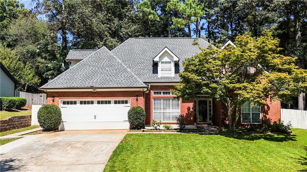 Looking for a BEAUTIFUL & CHARMING 4 BEDROOMS AND 2.5 BATHS to call HOME!? THEN LOOK NO FURTHER!! This perfect home is conveniently close to I-85, Ga-316, desired location between Lawrenceville and Suwanee area, good schools, close to hospitals, shops and restaurants! The house features MASTER ON MAIN with double vanities, cathedral ceiling in the great room, granite counter tops, and freshly painted white kitchen cabinets! Back yard provides a great outdoor living area with its own fire-pit and ample spaces for gardening. With a long driveway and on a CUL-DE-SAC, the house is perfect for quiet living, or when entertaining! This house is MOVE-IN-READY with owners willing to give the sofa set in the great room and the dining set as a BONUS!! WHAT ARE YOU WAITING FOR? TOUR TODAY AND MAKE THIS HOUSE YOURS!!