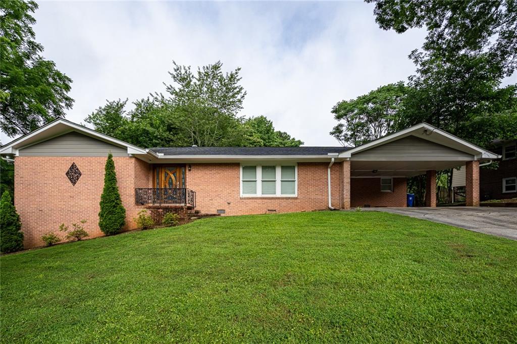 Welcome to this beautifully renovated, all-brick contemporary home nestled in the desirable community of Tucker, GA. This spacious 3-bedroom, 2.5-bath residence offers modern living with timeless charm—perfect for families or professionals seeking comfort, style, and convenience. Step inside to discover a fully updated interior featuring a bright open layout, sleek finishes, and designer touches throughout. The expansive living area flows seamlessly into a gourmet kitchen equipped with stainless steel appliances, quartz countertops, and custom cabinetry—ideal for both everyday living and entertaining. Downstairs, a finished basement provides versatile bonus space for a home office, media room, or guest suite. Enjoy the outdoors with a large, fenced-in backyard—perfect for pets, play, or hosting summer gatherings. The spacious lot offers privacy and room to relax.Conveniently located near downtown Tucker, you’ll be just minutes away from some of the area’s best dining, shopping, and entertainment. Enjoy local favorites like Matthews Cafeteria, The Local No. 7, Ford's BBQ, and Hot Betty’s Breakfast Bar. For outdoor enthusiasts, Henderson Park and Smoke Rise Country Club are nearby, offering trails, tennis, and more. With easy access to I-285, Hwy 78, and major job centers like Emory, CDC, and Northlake, this home offers both comfort and connectivity.