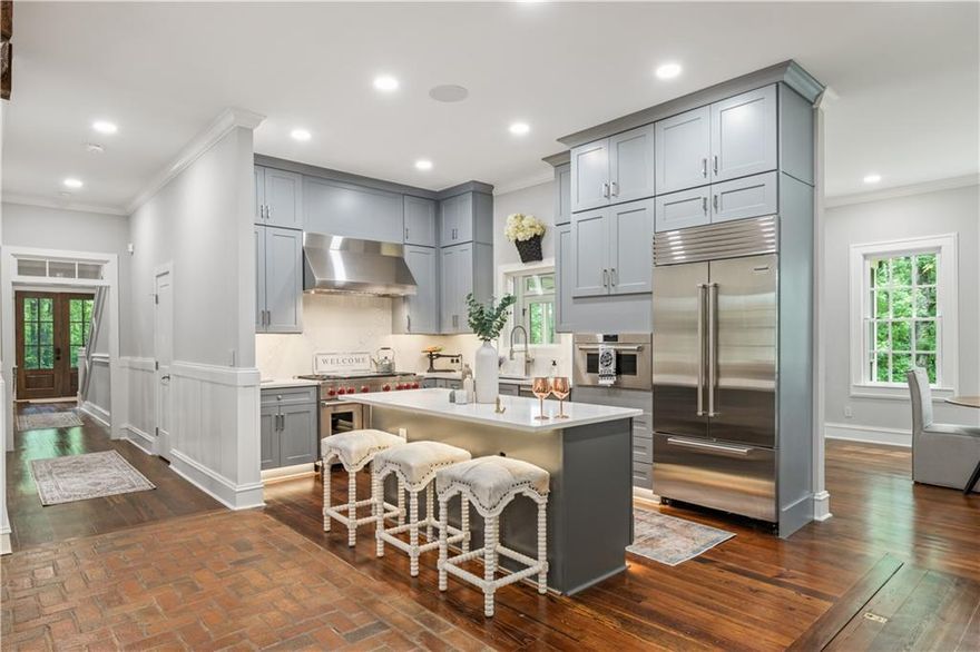 Motivated Seller! 
This 1986-built replica farmhouse per previous owner, situated on nearly 10 acres of tranquility, this meticulously renovated 2022 and finished 2024 equestrian estate offers the perfect blend of rustic charm and contemporary modern luxury farmhouse. Home has total counting Cottage 7 Bedrooms and 5.5 Bathrooms. As you enter the front gates and travel up the newly paved driveway, you’ll be greeted by lush pastures and thoughtfully designed landscaping. Equestrian enthusiasts, the property features three fenced turn-out pastures, a back-gated entrance for trailers, and a newly renovated 5-stall horse barn with a stone-paved floor, leveled stalls, tack room, horse wash area, and ample storage for equipment. These facilities provide an exceptional environment for both horses and their owners.

The beautiful cottage over the newly renovated three car garage with epoxy floors., every detail has been thoughtfully designed.  molding, 11-foot ceilings, refinished stained pinewood floors, shiplap accents, and recessed lighting create a blend of timeless charm and modern elegance. The spacious primary bedroom is a tranquil retreat, with a spa-inspired bathroom featuring remote-controlled features and a custom oversized walk-in closet. The open-concept chef’s kitchen, equipped with Wolf appliances and a Sub-Zero refrigerator, overlooks a fireside living room and library with a rustic barn-wood beam and brick floors. Below the kitchen lies a root cellar for additional storage and a storm shelter. A finished basement features a media room, wet bar, workout space, and tech closet.

The open-concept layout flows effortlessly, enhanced by a neutral palette and clean, timeless lines that create a sense of effortless luxury. Whether you’re hosting vibrant gatherings or indulging in quiet relaxation, this home adapts beautifully to your lifestyle. Offering the perfect fusion of comfort, style, and versatility.

Spindlewick Farm has views of a peaceful creek and access to nature trails complement the thoughtfully designed modern farmhouse. Here, you’ll find more than just a home—you’ll discover a lifestyle. Step into a masterpiece where modern elegance meets rustic charm. This stunning home seamlessly blends contemporary design with natural farmhouse warmth, featuring rich wood accents that add depth and character. Every carefully curated finish strikes a perfect balance between sleek sophistication and the inviting essence of equestrian-inspired living. 

This dreamy outdoor living is equally impressive, with a large composite deck and a screened-in porch. The garage includes a renovated carriage house with 1 bedroom, 1 bath an open-concept kitchen and living area perfect for guests or additional living space.

Expertly staged by Elevated Interiors Atlanta, furniture and décor are available for purchase separately, offering a seamless transition for its next owner. For tech enthusiasts, the property boasts a state-of-the-art security system with night vision and facial recognition, outdoor surround sound speakers, and over 200 programmable lights with customizable holiday settings all controlled by an advanced smart home system.

For travelers, the proximity to private PDK Airport and just a 45-min drive to Hartsfield-Jackson Atl. Int. Airport offers unmatched accessibility. Highly desirable Milton/Alpharetta area, this property offers unmatched convenience. Located just minutes from Wills Park Equestrian Center, Milton Stables, boutique dining and shopping experiences of Alpharetta City Center, it’s an ideal base for those who cherish culture, nature, and community. The vibrant art and music scenes of Alpharetta provide a unique Southern charm, ensuring there’s always something to discover.

Elegantly furnished by Elevated Interior Atlanta Design Studios. Option to purchase furniture separately at closing.
No HOA & 2nd entrance upper pasture. Receive $6,000 Lender Credit using Steve Lake, CMG Mortgage.