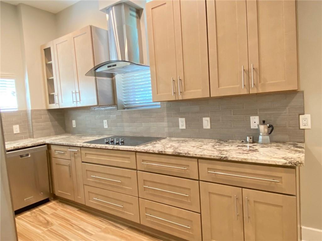 Newer modern home for rent in the most quiet street in Edgewood, Open floor plan with high ceilings and light filled views. Tile flooring on main floor and hardwood on 2nd floor, energy efficient home with double panel windows. Designed kitchen with stainless steel appliances, and Granite countertops. Large living room, dining area, bedroom on main floor that can be used as an office with a private exterior and interior entry. Designed bathrooms with frameless glass shower doors, washer & dryer are included. Beautiful wrap around balcony with an access from each one of the upper bedrooms. Private back yard with a patio and a fenced garden area, beautiful landscaping. Walk to MARTA, shopping & restaurants in the Edgewood Retail District. Easy access to the Trolley Trail and BeltLine, the Edgewood Marta redevelopment, Little 5 Points, Inman Park and the best of Intown living.