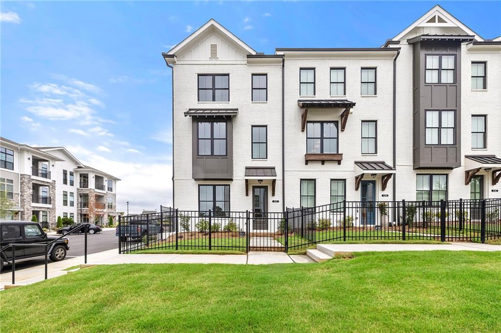 Brand New & Right in the Middle of It All! Welcome to your next chapter in Market Square at Sawnee Village—a vibrant new community where modern living meets small-town charm. This brand-new townhome (built by The Providence Group, so you know it's good) offers 3 spacious bedrooms, 3.5 baths, and plenty of room to spread out, unwind, and enjoy the perks of living in a mixed-use neighborhood that truly has it all. Need to be close to everything?
You're literally steps from Otwell Middle and Cumming Elementary, next door to the public library, and just a minute from the fun, food, and entertainment at the Cumming City Center. Quick access to GA400 means you can commute like a boss—or head to Halcyon for dinner and shopping, or North GA for a weekend escape. Inside, you’ll love the fresh finishes, open-concept living, and smart layout that includes a private bedroom with full bath on the terrace level—perfect for guests, in-laws, or your favorite work-from-home setup. Whether you're grabbing coffee, heading out for live music at City Center, or soaking in the small-town feel with big-town convenience, this home puts you right in the mix. Ready to move in and start living the lifestyle? We can’t wait to show you around. *Resident Benefit Package – $15/month Includes quarterly air filter delivery, online tenant portal, after-hours emergency maintenance, and one-time late fee forgiveness (if rent is paid in full by the 10th). Applicant Requirements: Credit score of 650+ and Monthly NET income at least 3× the rent.*
