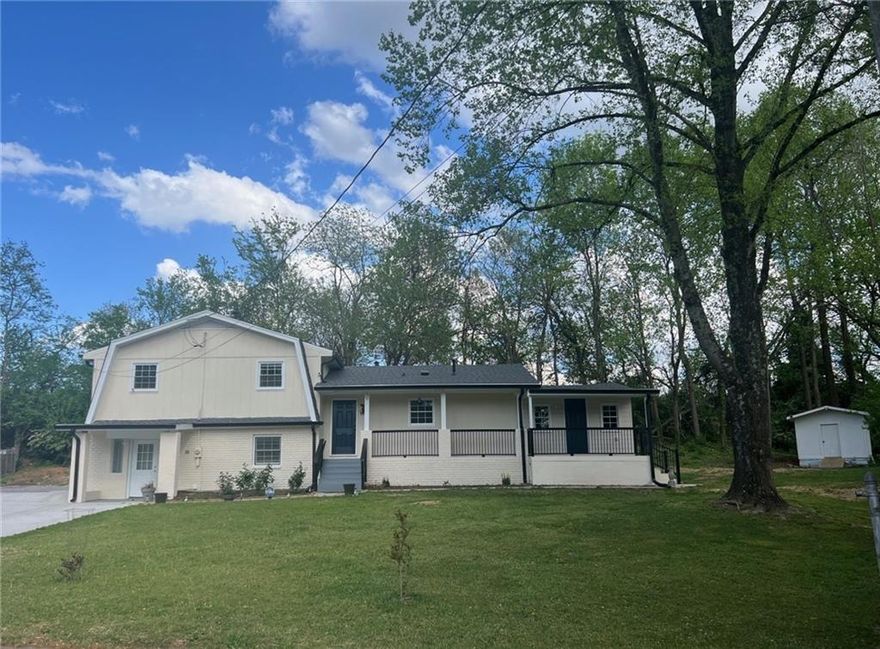 Up-dated split level with In-Law Suite in Marietta! Run to see this home to a non-HOA community. Features a private entrance to a full-in-law suite. This home is ideal for investors or those seeking a rental income or a multi-generational living. Its location can't be beaten. Close to everything but in a quiet, well-established neighborhood! Easy access to major highways, the city, shopping, dining, parks and within walking distance to Kennestone Hospital. This wonderful, move in ready, brick & frame home offers so much in the way of both comfort and function.  Large family room with laminate flooring. Well equipped kitchen offers custom cabinetry, stainless appliances, stone countertops and looks out to both the family room and separate dining area or den with cathedral ceiling.
Having extended family and guests stay? short or long term? couldn't be easier in this home due to the full-in-law suite. Total of 4 bedrooms plus a flex room or computer room with closet.
New paint in/out, new architectural roof, new HVAC, new flooring. New out building. The home sits on a roomy, Cul-de -Sac with an extra-long new driveway! All of this is in a wonderful Cobb County location. Don't miss the opportunity to see this one!