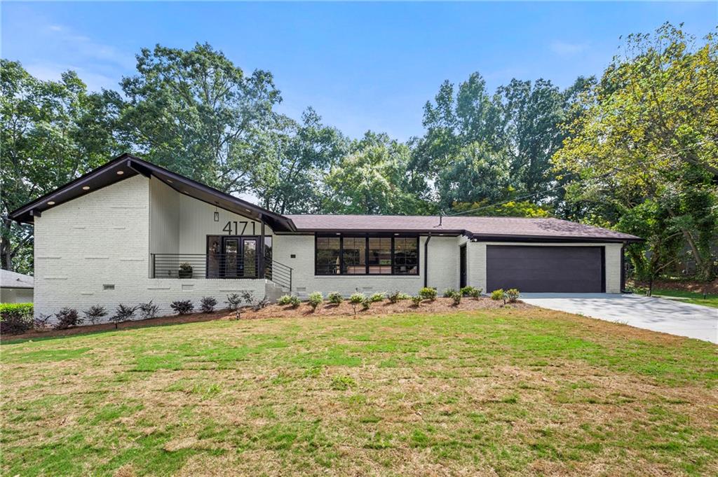 Unbelievably priced and fully reimagined, this Decatur beauty won’t last long. This isn’t just a house — it’s The Liffey House, where modern design meets peace of mind. A masterpiece of modern living right in Decatur. Every detail has been reimagined to perfection, beginning with brand-new plumbing, windows, electrical, roof, and HVAC for effortless peace of mind. Step inside and you’re immediately immersed in a world of polished elegance, luxurious finishes, and curated sophistication.
From the sleek new flooring underfoot to the designer fixtures and modern appliances, this home radiates refinement. Sunlight dances through the expansive windows, highlighting the seamless blend of comfort and couture design. The sunroom retreat off the primary suite creates a sanctuary that whispers resort living, where mornings begin with tranquility and evenings close in serenity.
Outdoors, the property transforms into a private escape — a sparkling, relined pool glistening like liquid diamonds, refreshed concrete patios, and a chic two-tiered backyard tailored for unforgettable soirées under the stars. Here, luxury isn’t an accessory — it's the lifestyle.
In a coveted non-HOA community, the possibilities are as boundless as your imagination. This residence is more than renovated — it has been reinvented, redefined, and revived into a glamorous statement piece worthy of your next chapter - the lifestyle you’ve been creating. Schedule your tour and see why The Liffey House is the one you’ve been waiting for.